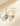 Pendientes en oro amarillo con diamantes talla brillante y topacio London Blue